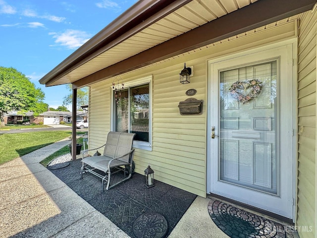 doorway to property with a porch