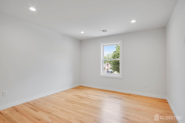709 Plainfield Ave, Piscataway, NJ 08854 - spare room featuring wood finished floors and recessed lighting