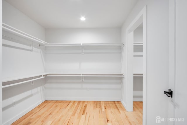 709 Plainfield Ave, Piscataway, NJ 08854 - spacious closet with wood finished floors