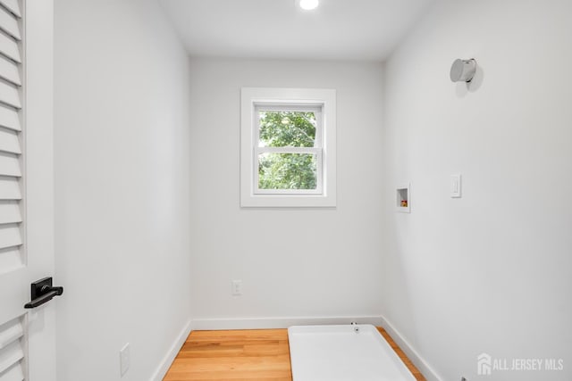 709 Plainfield Ave, Piscataway, NJ 08854 - laundry area with recessed lighting, wood finished floors, and hookup for a washing machine