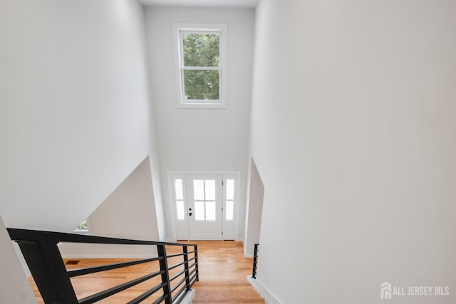 709 Plainfield Ave, Piscataway, NJ 08854 - stairway featuring wood finished floors and a towering ceiling