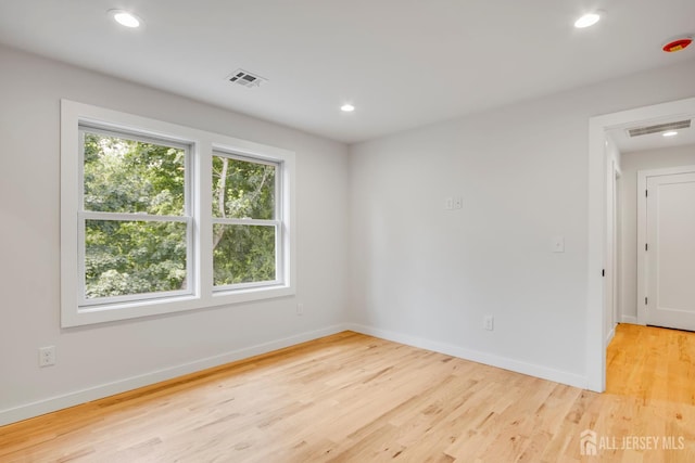 709 Plainfield Ave, Piscataway, NJ 08854 - unfurnished room featuring light wood-type flooring and recessed lighting