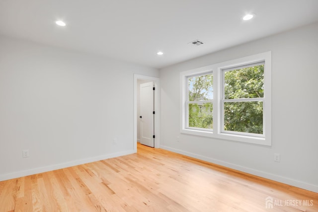 709 Plainfield Ave, Piscataway, NJ 08854 - empty room featuring light wood-style flooring and recessed lighting