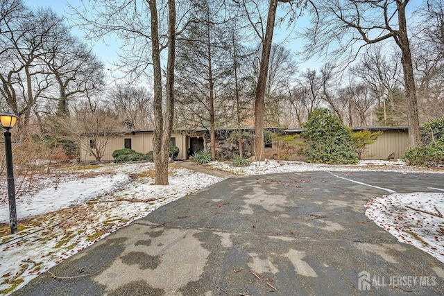 view of front of home with uncovered parking