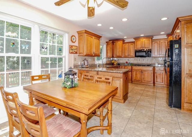 89 King St, Edison, NJ 08820 - kitchen featuring black appliances, ceiling fan, healthy amount of natural light, decorative backsplash, and recessed lighting