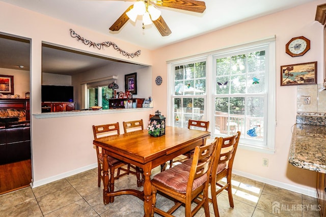 89 King St, Edison, NJ 08820 - dining room with a ceiling fan and light tile patterned flooring