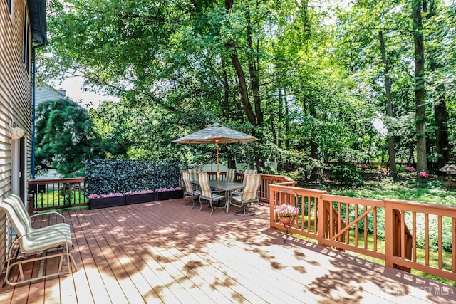 89 King St, Edison, NJ 08820 - wooden terrace featuring outdoor dining space and view of wooded area