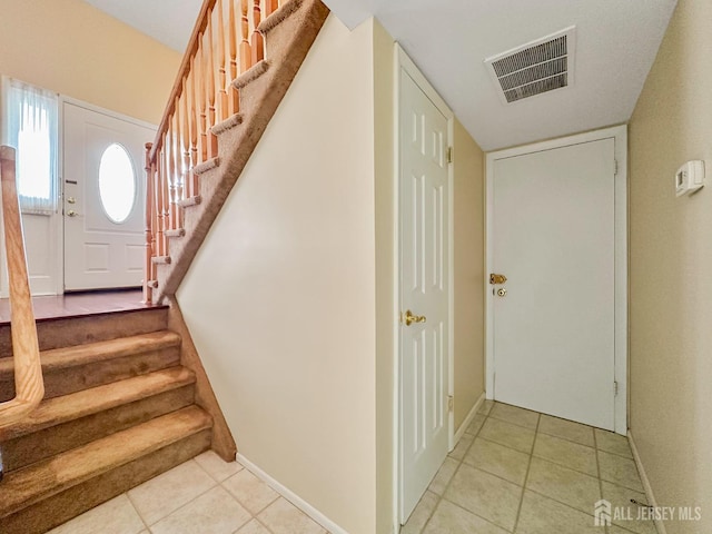 12 Dana Estates Dr, Old Bridge, NJ 08859 - staircase with tile patterned floors and baseboards