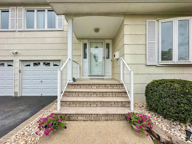 12 Dana Estates Dr, Old Bridge, NJ 08859 - property entrance with asphalt driveway and an attached garage