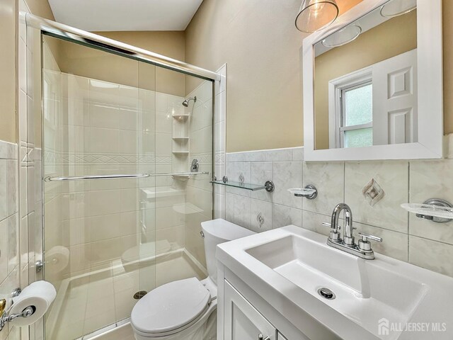 12 Dana Estates Dr, Old Bridge, NJ 08859 - full bathroom with toilet, a shower stall, vanity, and tile walls
