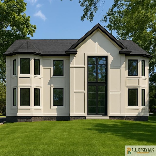 202 Willow Ave, Piscataway, NJ 08854 - rear view of house featuring a lawn, stucco siding, and roof with shingles