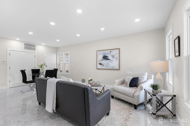 251 Church St, South Amboy, NJ 08879 - living room with recessed lighting and light marble finish floors