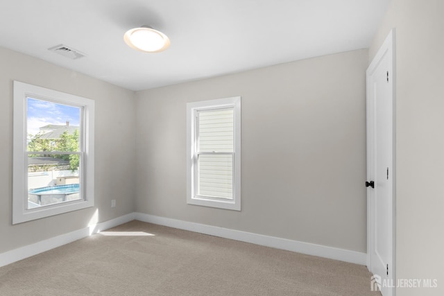 251 Church St, South Amboy, NJ 08879 - spare room featuring light carpet