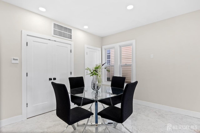 251 Church St, South Amboy, NJ 08879 - dining space with light marble finish flooring and recessed lighting