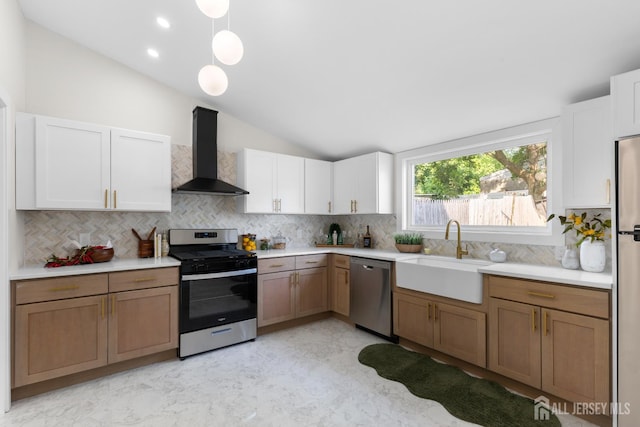 251 Church St, South Amboy, NJ 08879 - kitchen with wall chimney range hood, stainless steel appliances, vaulted ceiling, backsplash, and light countertops