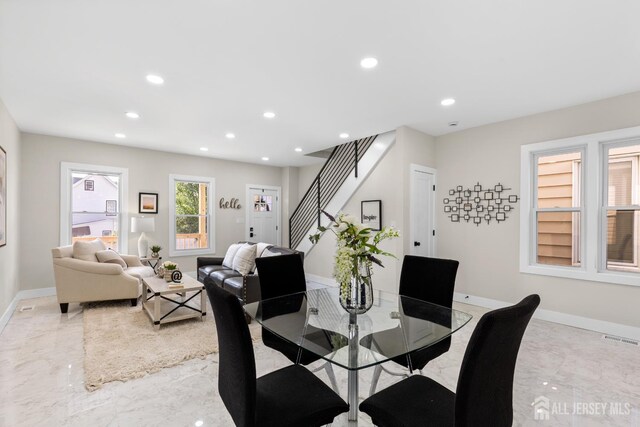 251 Church St, South Amboy, NJ 08879 - dining room featuring light marble finish flooring, recessed lighting, and stairway