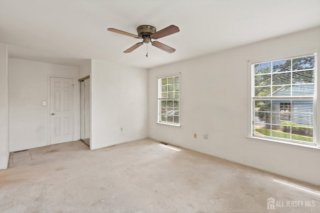 153 Concordia Cir Unit D, Monroe, NJ 08831 - unfurnished room with light carpet and a ceiling fan