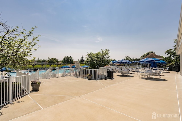 153 Concordia Cir Unit D, Monroe, NJ 08831 - view of patio featuring a community pool