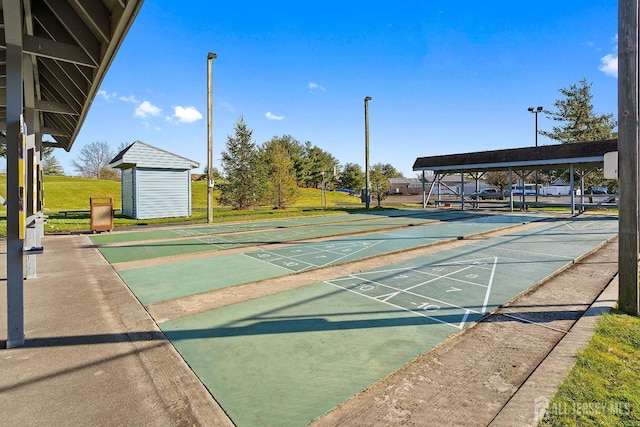153 Concordia Cir Unit D, Monroe, NJ 08831 - view of home's community with shuffleboard and an outdoor structure