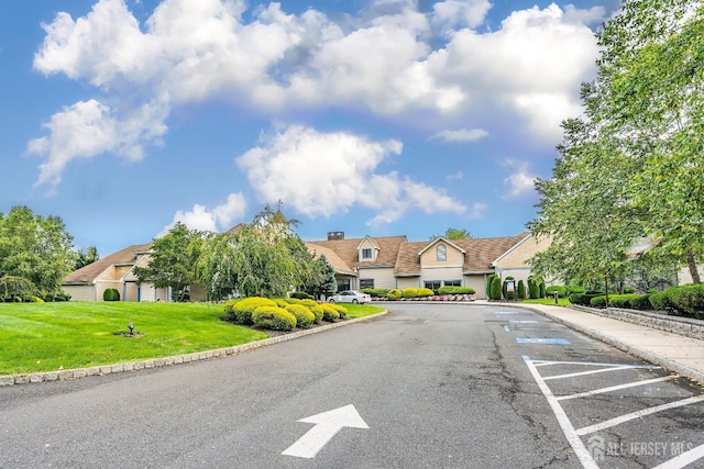 153 Concordia Cir Unit D, Monroe, NJ 08831 - view of asphalt street featuring curbs and a residential view