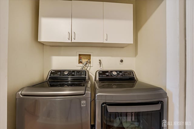 325 Mcdowell Dr, East Brunswick, NJ 08816 - laundry area featuring independent washer and dryer and cabinet space