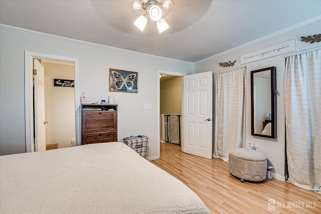 325 Mcdowell Dr, East Brunswick, NJ 08816 - bedroom featuring ornamental molding, light wood finished floors, and a ceiling fan
