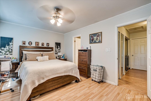 325 Mcdowell Dr, East Brunswick, NJ 08816 - bedroom with light wood finished floors, crown molding, attic access, and a ceiling fan