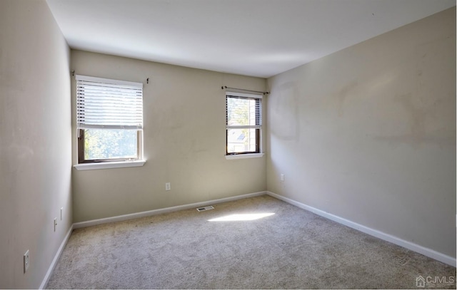 view of carpeted spare room