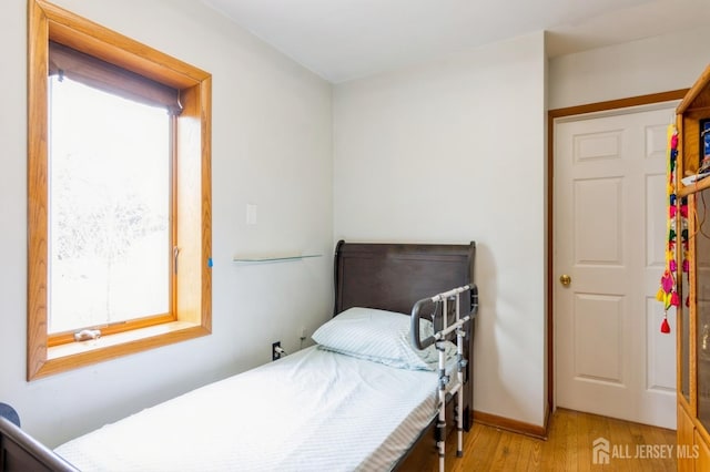 40 Riverview Ave, Piscataway, NJ 08854 - bedroom with light wood-style flooring and baseboards