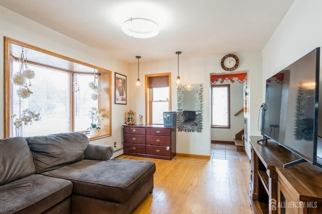 40 Riverview Ave, Piscataway, NJ 08854 - living area featuring light wood-style flooring and baseboards