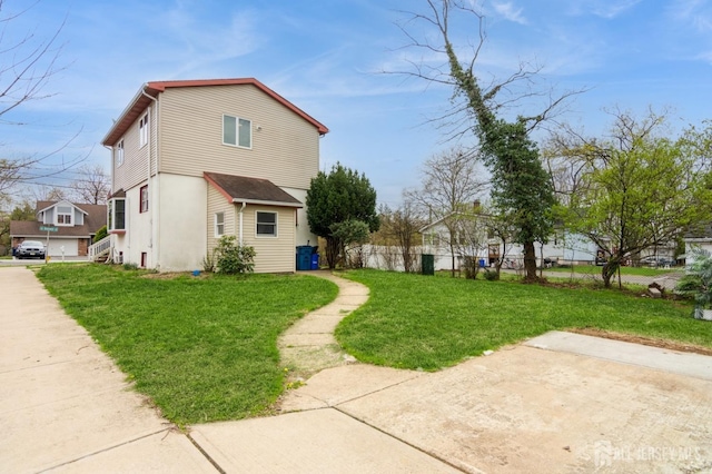 40 Riverview Ave, Piscataway, NJ 08854 - view of property exterior featuring stucco siding