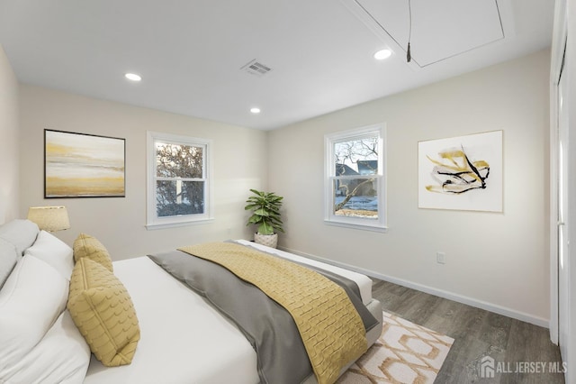 bedroom featuring dark hardwood / wood-style floors