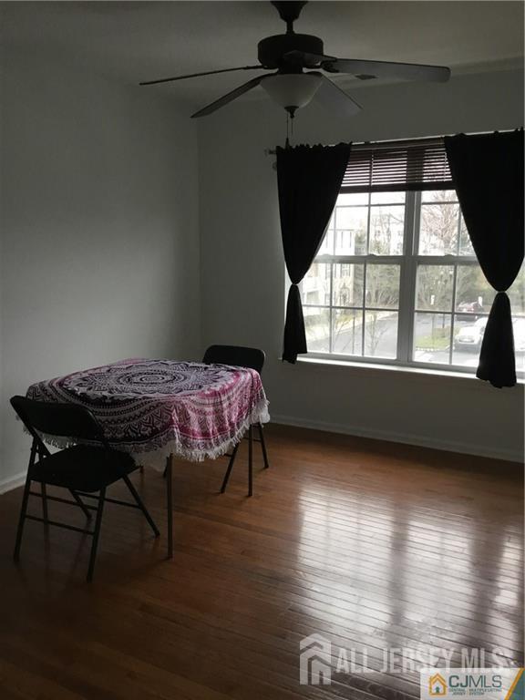 69 Liddle Ave, Edison, NJ 08837 - dining space featuring baseboards, wood finished floors, and ceiling fan