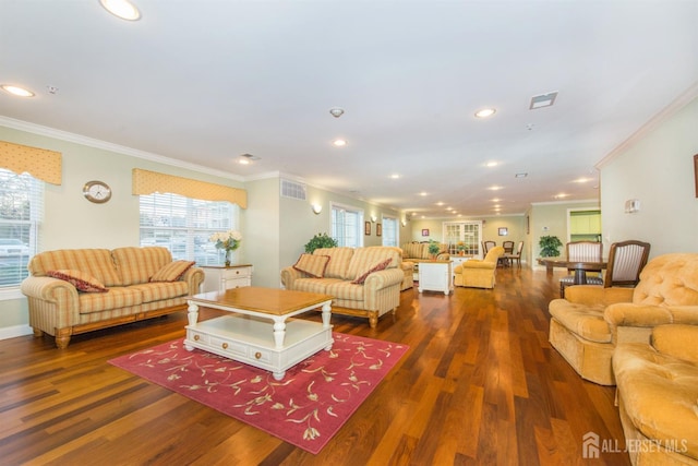 69 Liddle Ave, Edison, NJ 08837 - living area with crown molding, wood finished floors, healthy amount of natural light, and recessed lighting