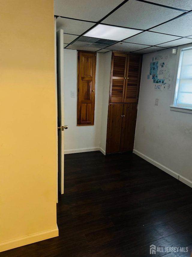 19 Spruce St, Port Reading, NJ 07064 - basement with dark wood-style floors and baseboards