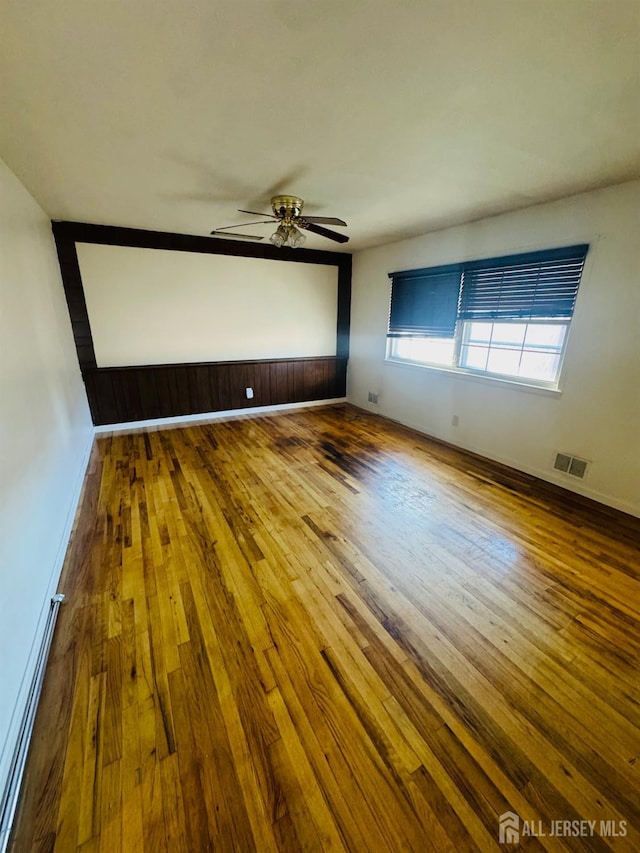 19 Spruce St, Port Reading, NJ 07064 - empty room featuring ceiling fan, wood-type flooring, and baseboards