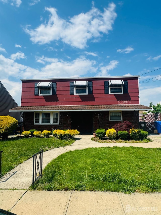 19 Spruce St, Port Reading, NJ 07064 - view of front of house with a front yard