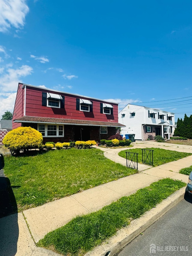 19 Spruce St, Port Reading, NJ 07064 - view of front of property with a front yard