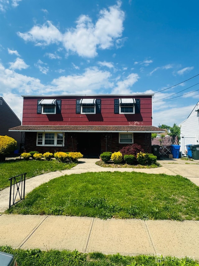19 Spruce St, Port Reading, NJ 07064 - traditional-style house featuring brick siding