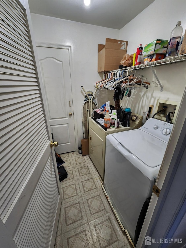 laundry area featuring laundry area and separate washer and dryer