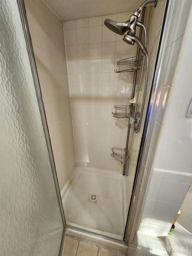 full bath featuring a stall shower