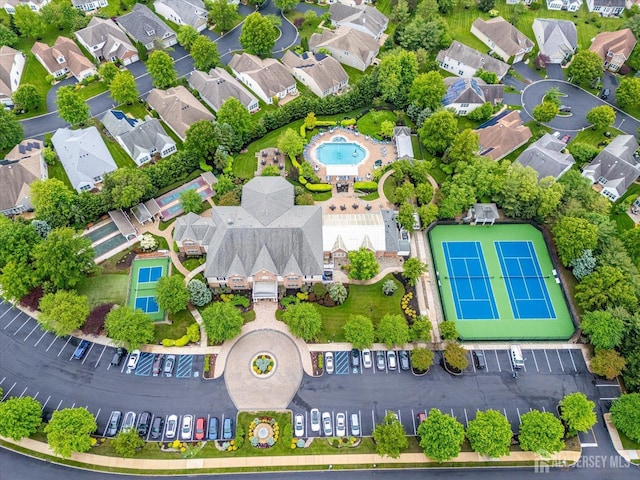 aerial perspective of suburban area with a pool area