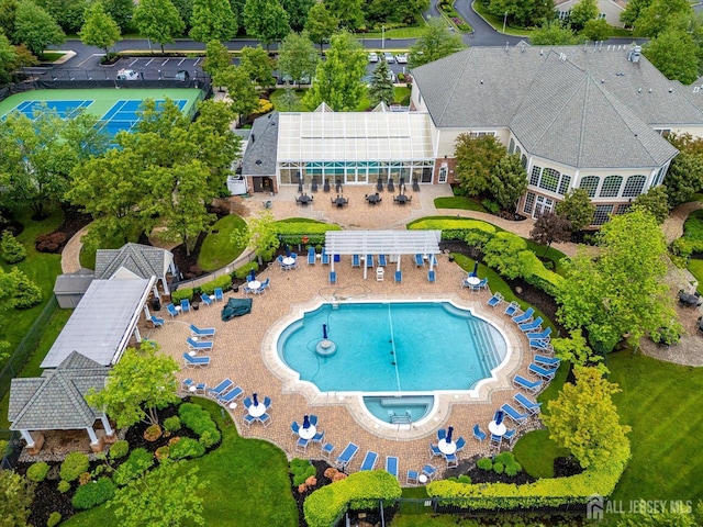 drone / aerial view of a pool area