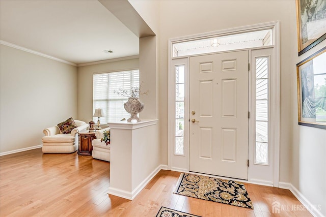 249 Spring Meadow Way, Monroe, NJ 08831 - foyer featuring light wood-type flooring, crown molding, and baseboards