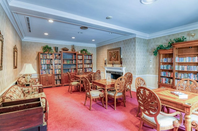 living area with carpet, wainscoting, a fireplace, and wallpapered walls
