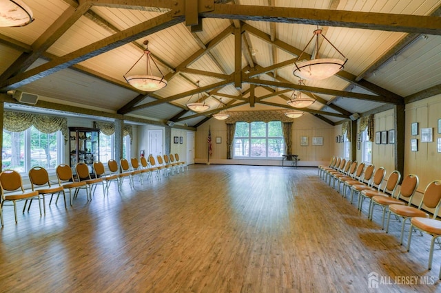 miscellaneous room featuring lofted ceiling with beams, wood finished floors, and wooden ceiling