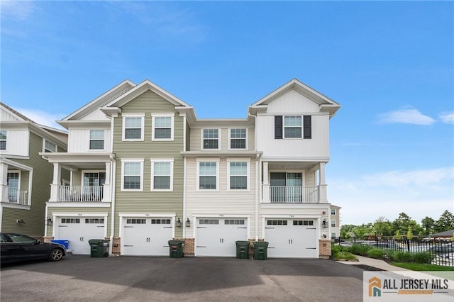 702 Station Rd, Dunellen, NJ 08812 - view of front of home with driveway and a garage