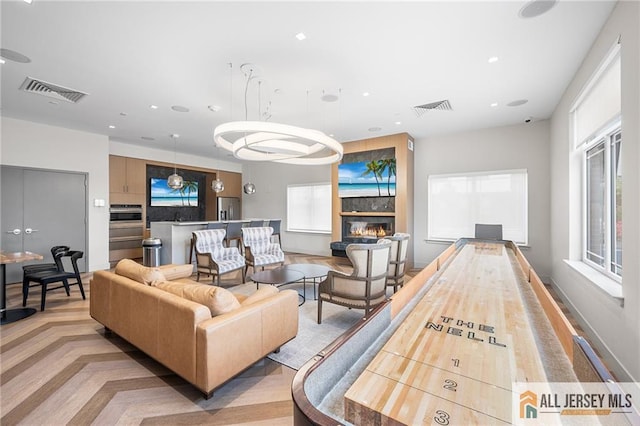 702 Station Rd, Dunellen, NJ 08812 - living room with a glass covered fireplace and recessed lighting