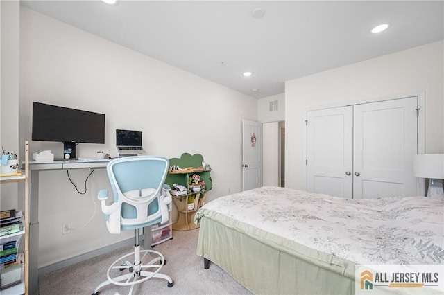 702 Station Rd, Dunellen, NJ 08812 - bedroom with light colored carpet, recessed lighting, a closet, and an office area