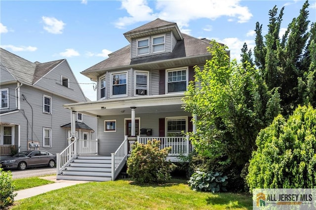 511 Grove St, Dunellen, NJ 08812 - traditional style home with covered porch and a front lawn